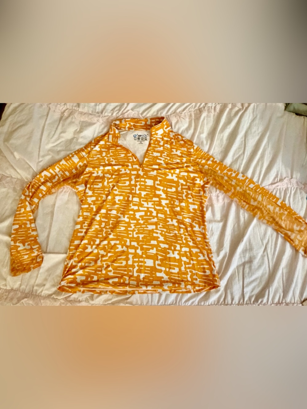 IBKUL Women's Long-Sleeve V-Neck top, UV protection in Orange and White Print